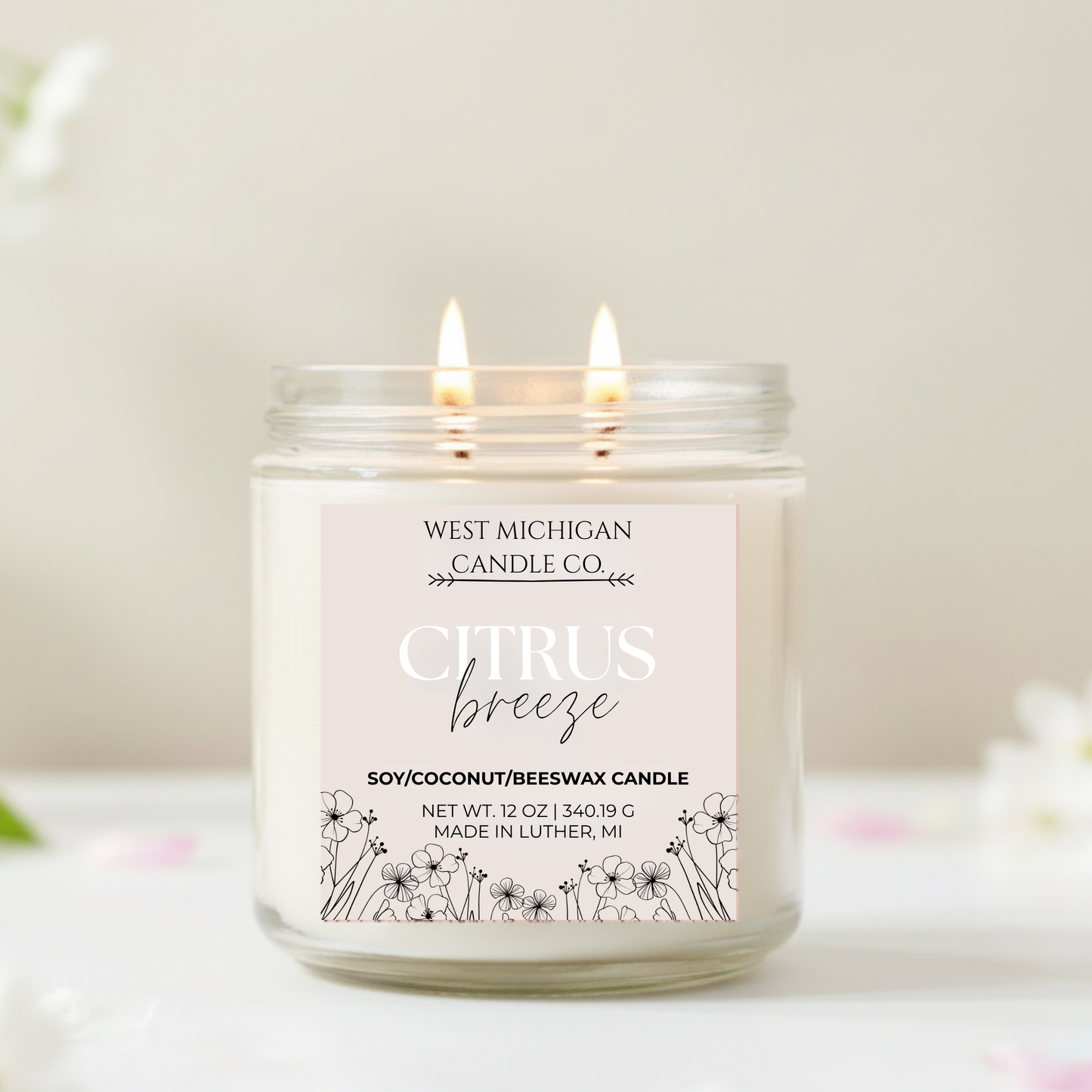 Citrus Breeze candle with a white label on a light background