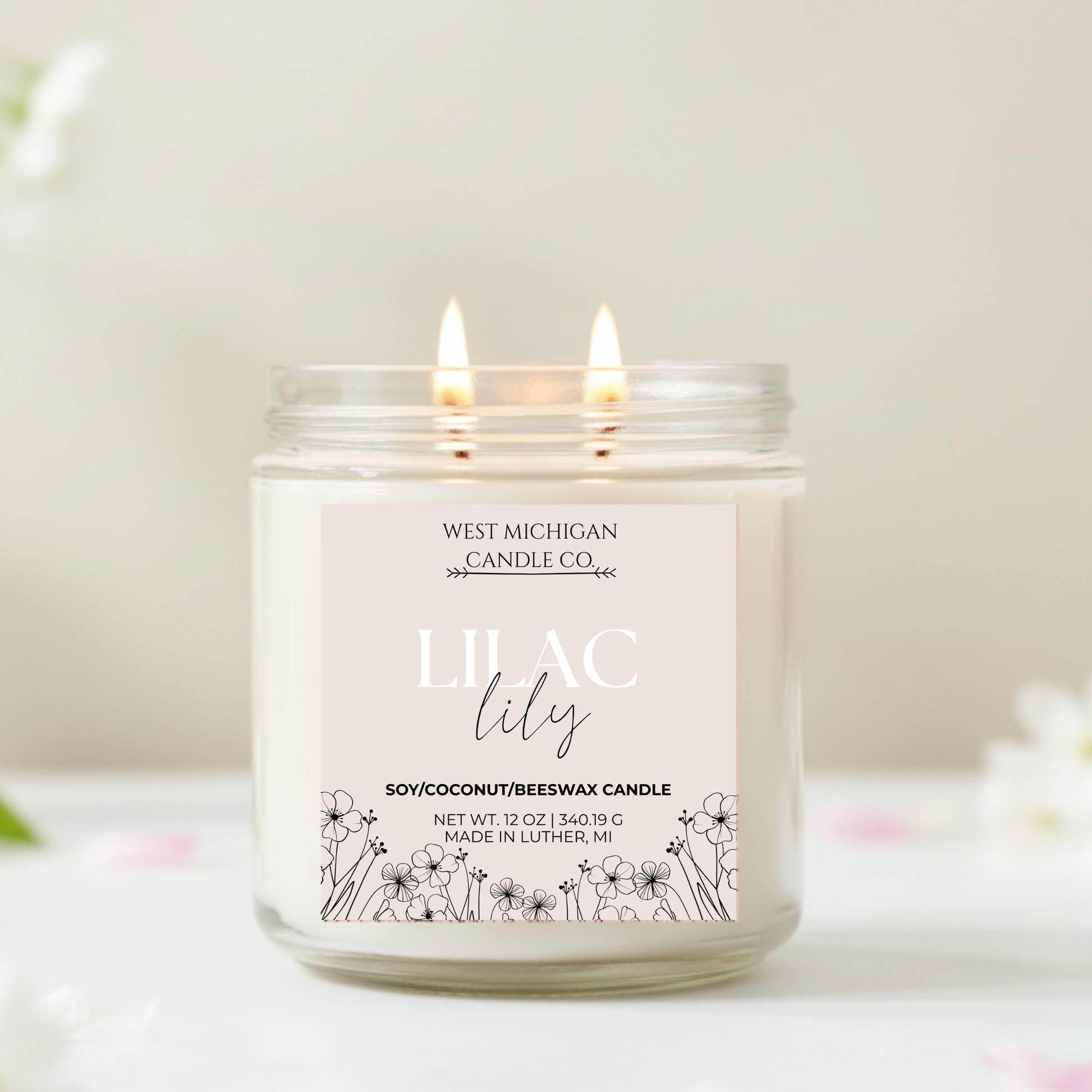 West Michigan Candle Co lilac lily candle on a white background